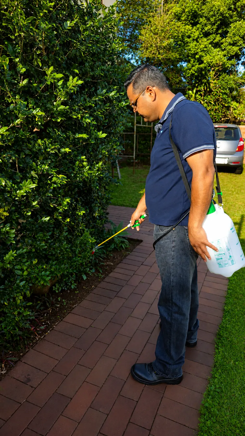 Mark Abraham applying targeted pest control treatment to a Durban home