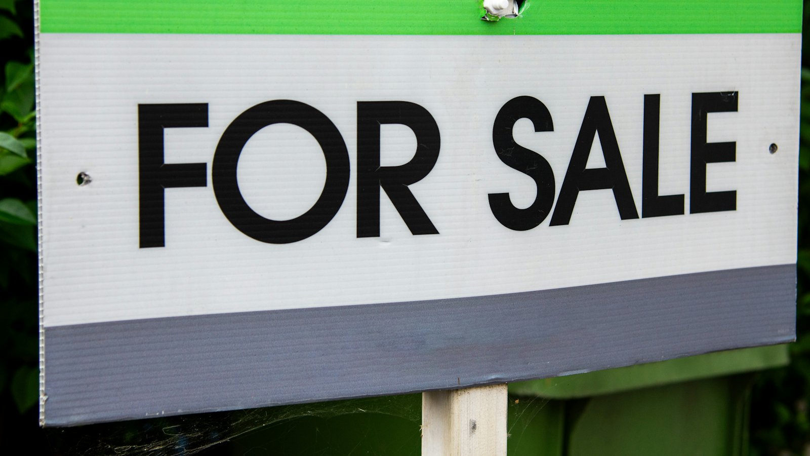 For sale sign outside a home