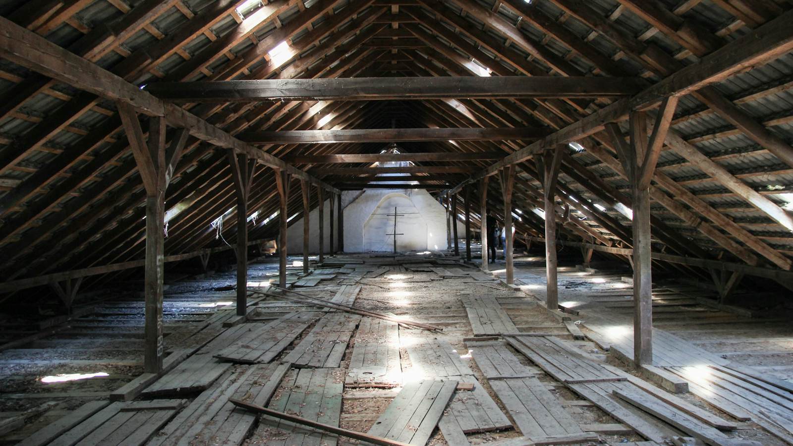 Timber roof trusses inside an attic